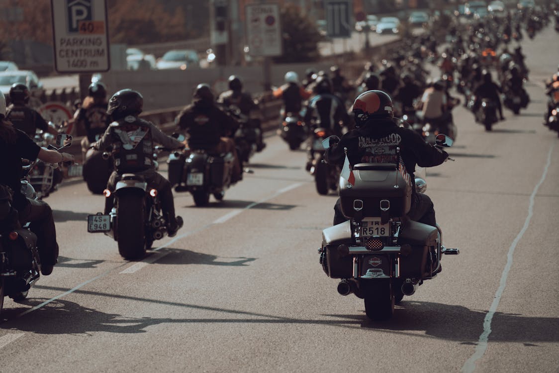 Riding With the Pack: Why Joining a Motorcycle Club Is Safer Than Riding Alone 3 Group of motorcyclists riding in formation on the road