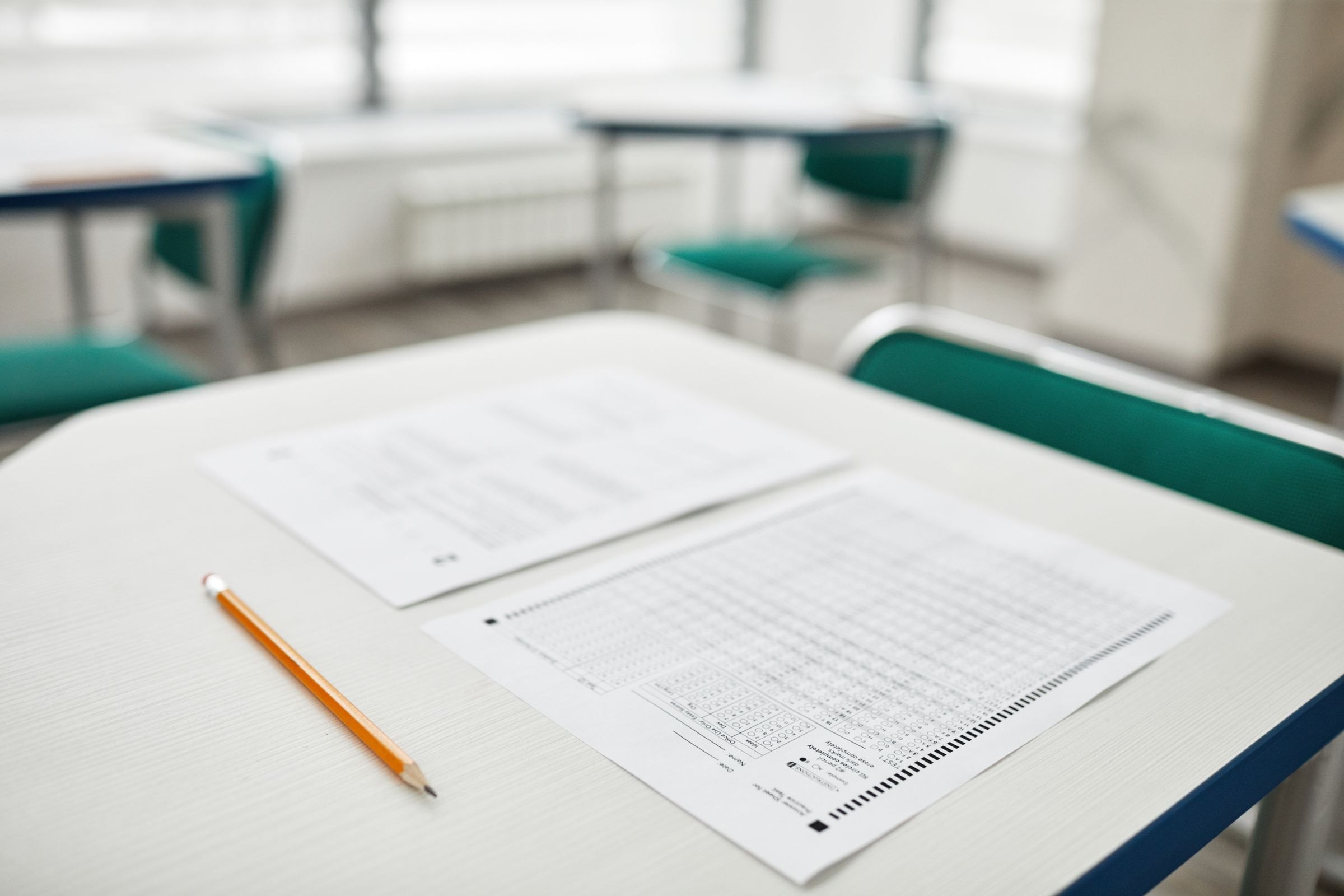 Nothing to Argue With: On Decisions, Dreams, and the Middle of the Work 2 A printed multiple choice answer sheet and a pencil on a desk, every possible answer already printed in advance